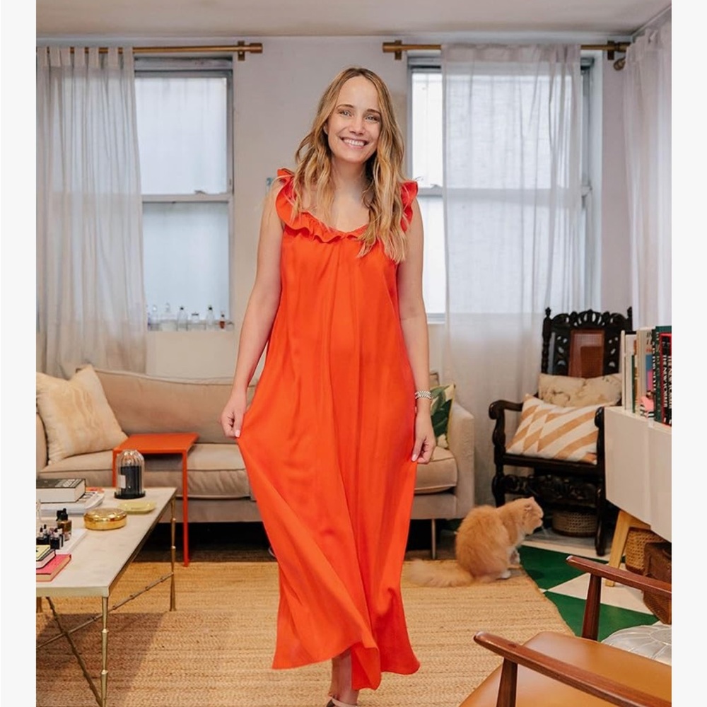 Grace Atwood The Drop Ruffle V-Neck Maxi Dress
Vibrant Orange Ruffle Maxi Dress